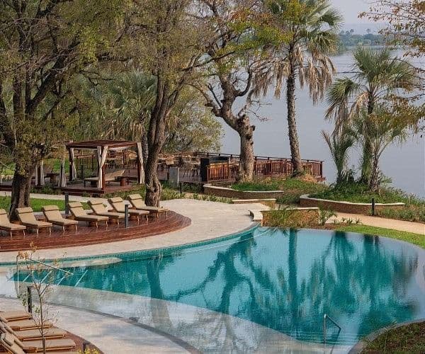 A riverfront resort in Livingstone with pool and gardens overlooking the Zambezi.