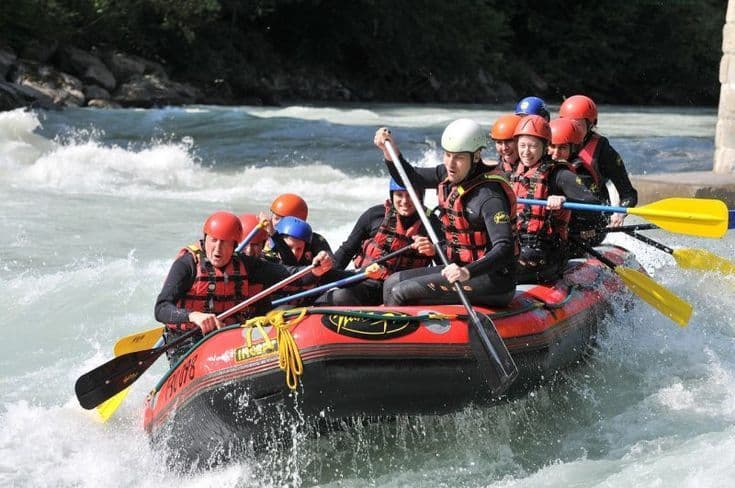Rafting boat navigating the rapids in Victoria Falls.